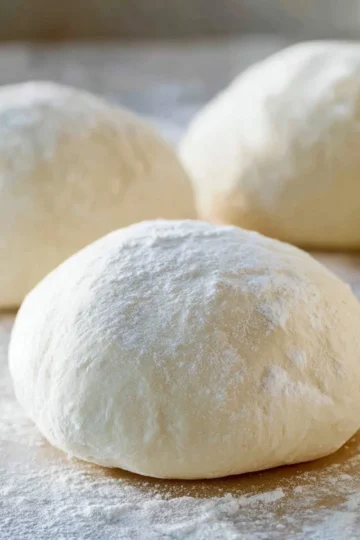 Freshly made homemade pizza dough ready for toppings