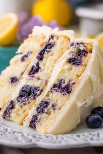 Delicious homemade Lemon Blueberry Cake with fresh blueberries and lemon zest.