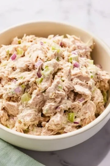 Delicious best tuna salad recipe served in a bowl with fresh ingredients.