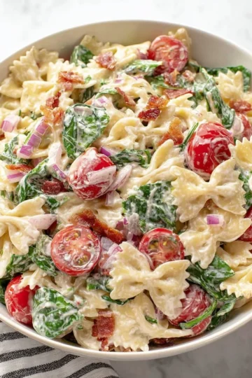 Fresh and colorful BLT Pasta Salad with bacon, lettuce, and tomatoes.