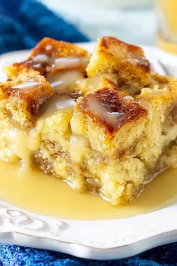 Delicious homemade bread pudding served with caramel sauce