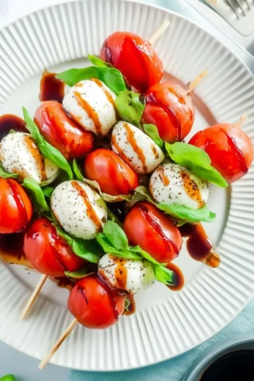 Delicious Caprese Skewers with mozzarella, basil, and cherry tomatoes