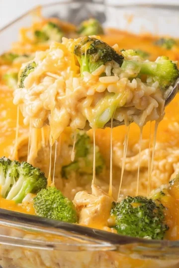 Cheesy Chicken Broccoli Rice Casserole baked in a dish topped with melted cheese