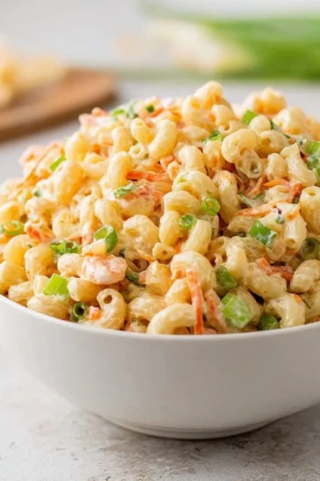 Delicious Hawaiian Macaroni Salad served in a bowl with fresh ingredients.