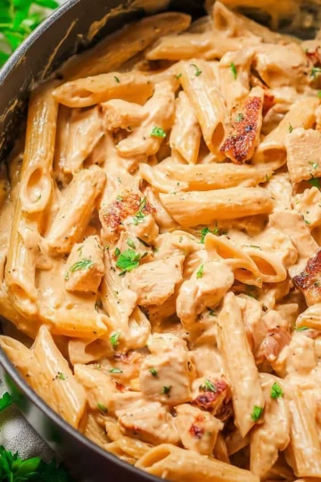 Delicious Marry Me Chicken Pasta with creamy sauce and herbs