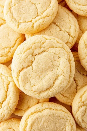 Delicious sugar cookies decorated with colorful icing and sprinkles