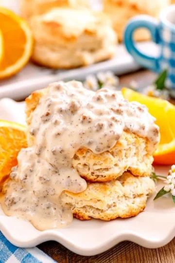 Delicious buttermilk biscuits smothered in creamy sausage gravy
