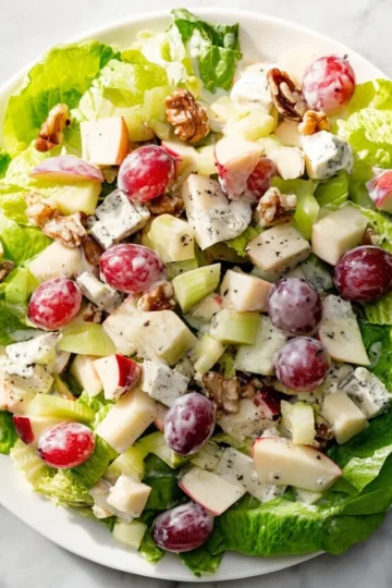Easy Waldorf Salad with apples, walnuts, and celery in a bowl