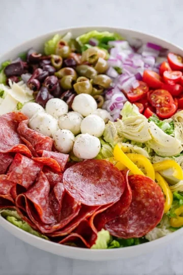 Italian antipasto salad with olives, cheese, and assorted vegetables
