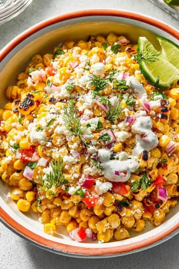Delicious Elote Salad with corn, cheese, and spices in a bowl