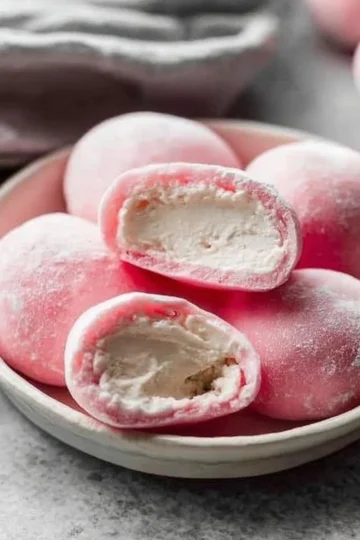 Delicious mochi ice cream with vibrant colors and unique flavors in a serving dish.