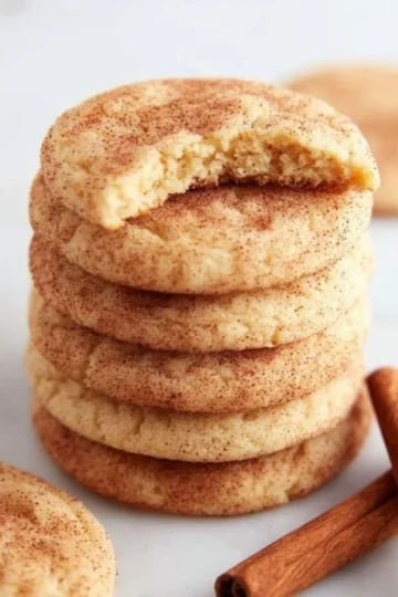 Freshly baked snickerdoodle cookies dusted with cinnamon sugar