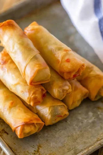 Homemade spring rolls filled with fresh vegetables and herbs