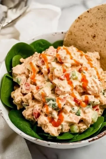 Delicious Buffalo Chicken Salad with shredded chicken and fresh vegetables