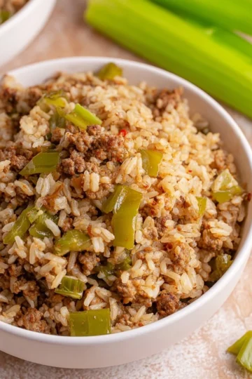 Plate of delicious Dirty Rice with herbs and spices