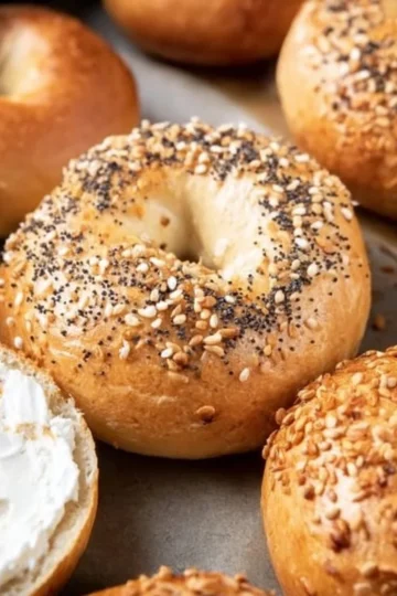 Homemade bagel freshly baked and ready to serve with toppings.